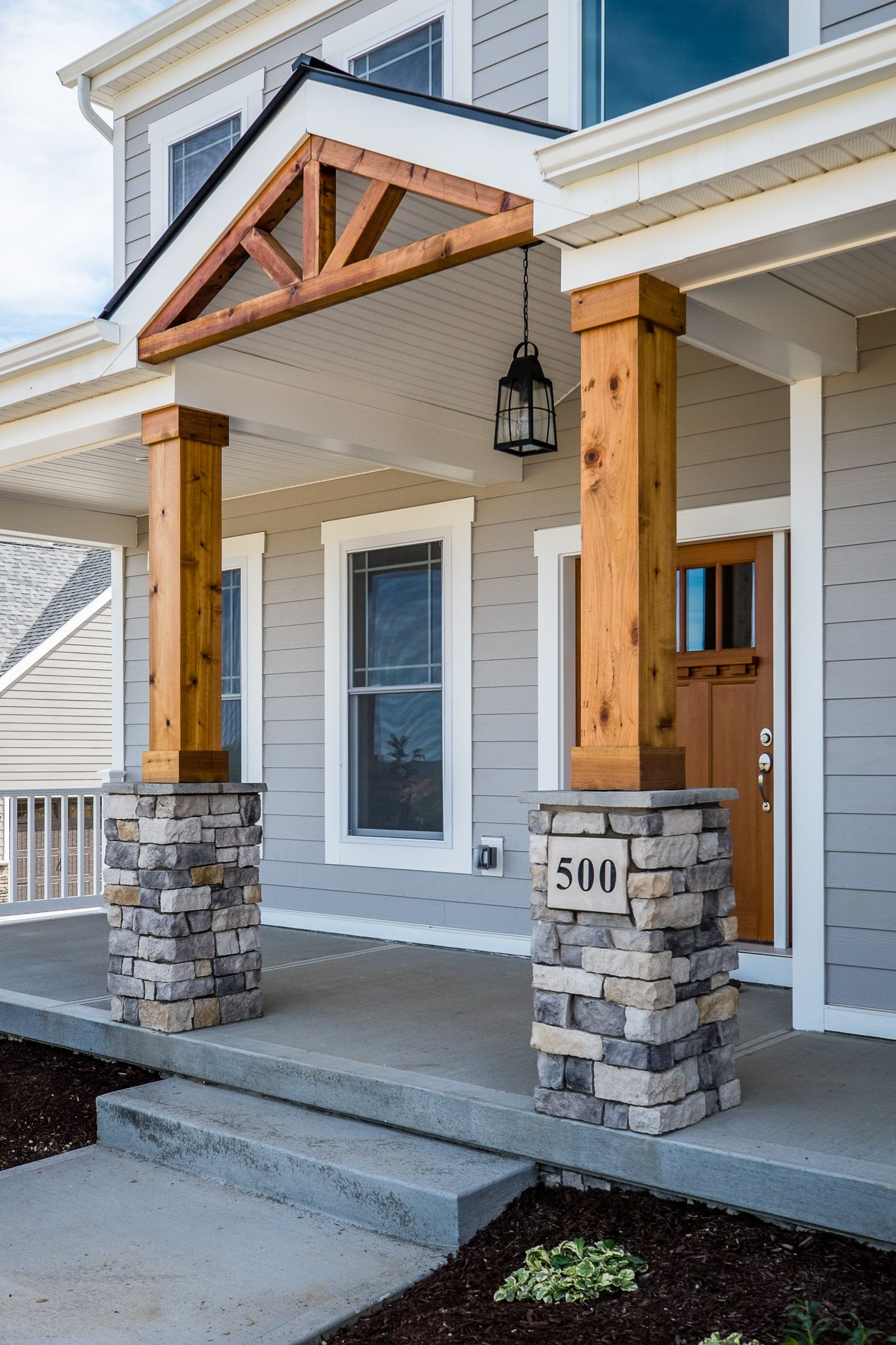 Gorgeous Front Porch Wood And Stone Columns Home Exteriors for