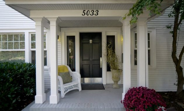 This Classic Front Entrance Features A Covered Front Porch With A pertaining to dimensions 1280 X 853