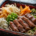 Japanese Bento Box With Beef And Vegetables